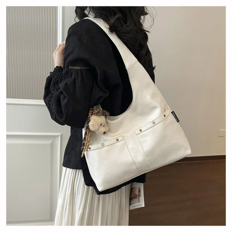 

Large Hobo Shoulder Bag & Stylish with Soft Faux Leather Finish and Front Pocket, Perfect for Everyday Casual Activities & Work