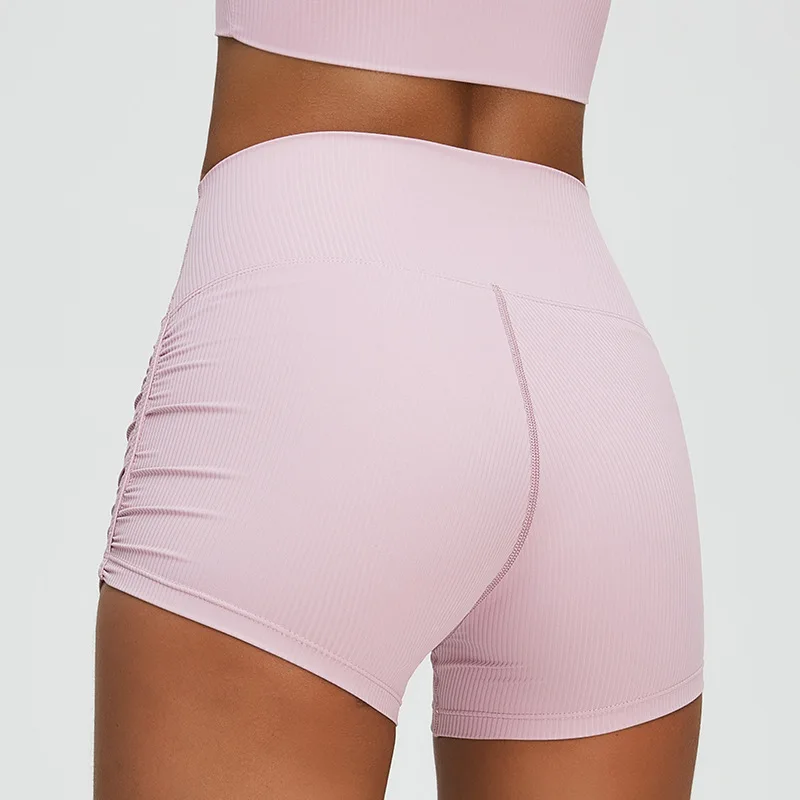 New Pleated Sports Shorts Women\'s Tight Peach Hip Lifting Fitness Shorts Quick Dried Fitness Push Up Triple Yoga Pants