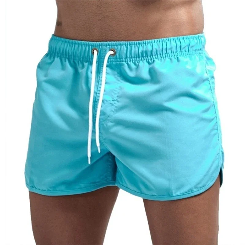 Hot Sales Mens Beach Shorts Summer Solid Color Quick Drying Man Swimwear Shorts Casual Quality Sweatpants Surf Swimming Shorts