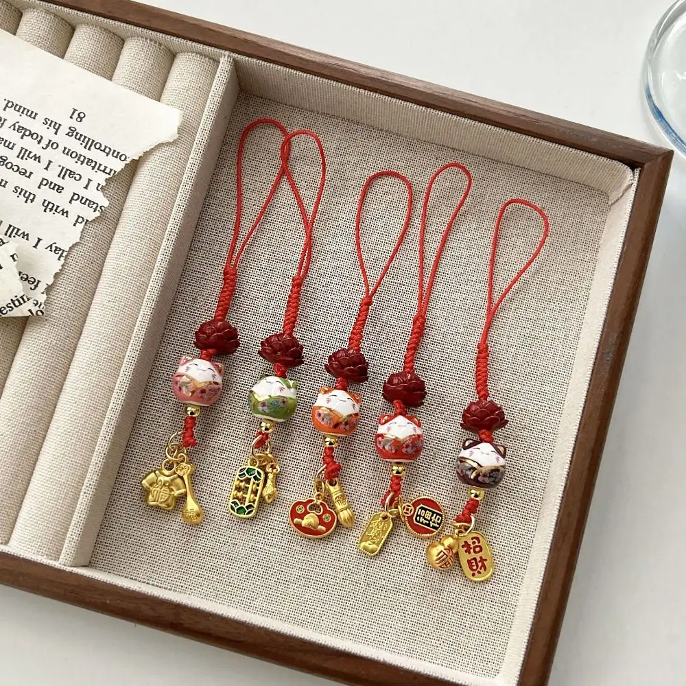 Cartoon Maneki Neko Portachiavi Cordino per telefono Cordino in ceramica Gatto fortunato Fascino per telefono Zaino Charms Decorazione borsa Tracolla per telefono gatto fortunato