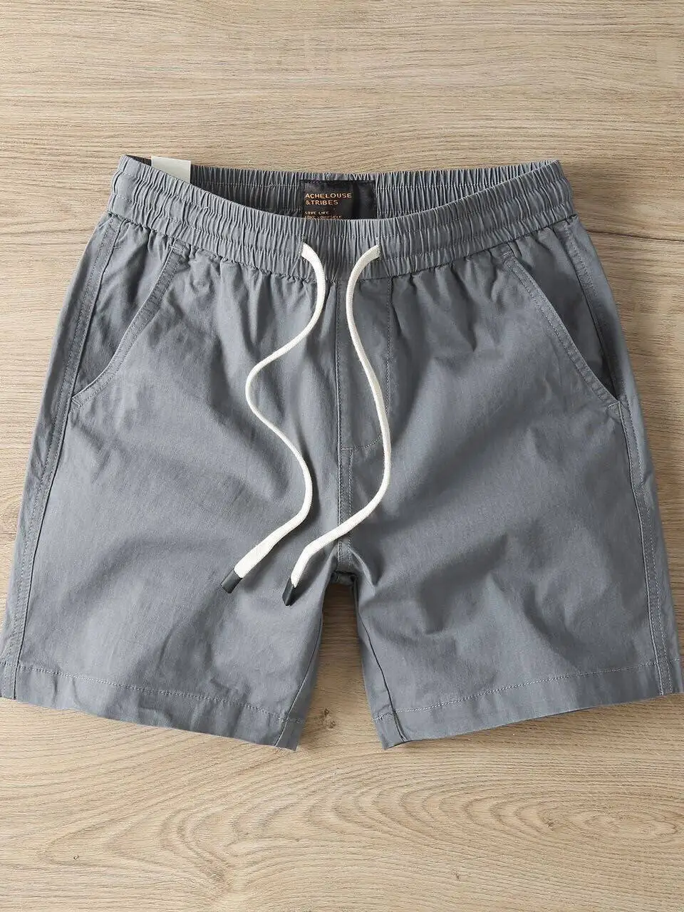 

Men's Fashionable Comfortable Breathable Slim Fit American Casual Workwear Short Pants Pure Color Four Leaf Capsule Summer 2026