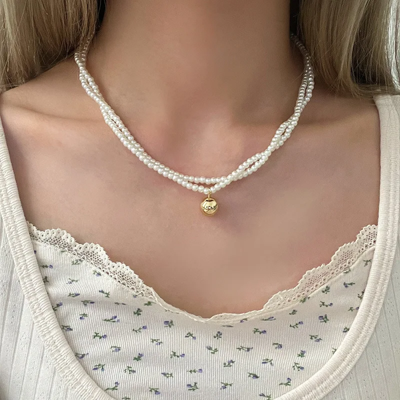 

Retro double-layer pearl necklace women's light luxury design high-end collarbone chain high-end neck chain new model