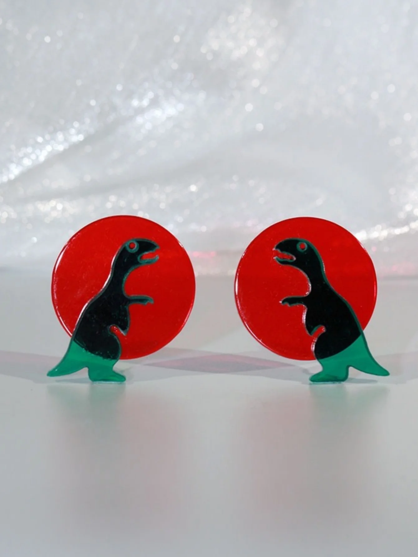 A Pair of Cute Cartoon Transparent Geometric Dinosaur Earrings in Contrasting Colors