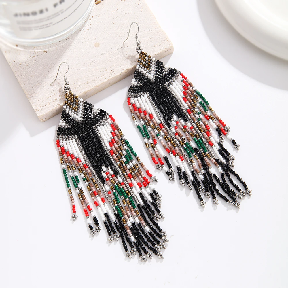 Rice bead earrings Tassel Fashion Simple Design Bohemia Hand knitting Alloy Geometry Beaded earrings