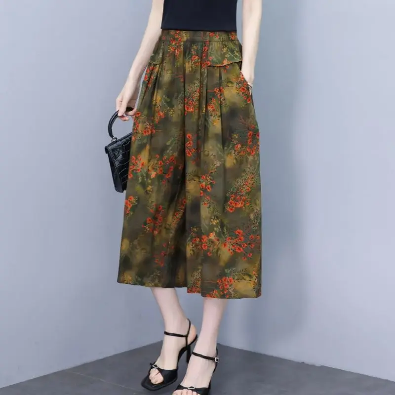 高齢者の女性の夏の新綿シルクフラワーパンツ女性の 7 分ワイドレッグパンツ弾性ハイウエストルーズスカートパンツ