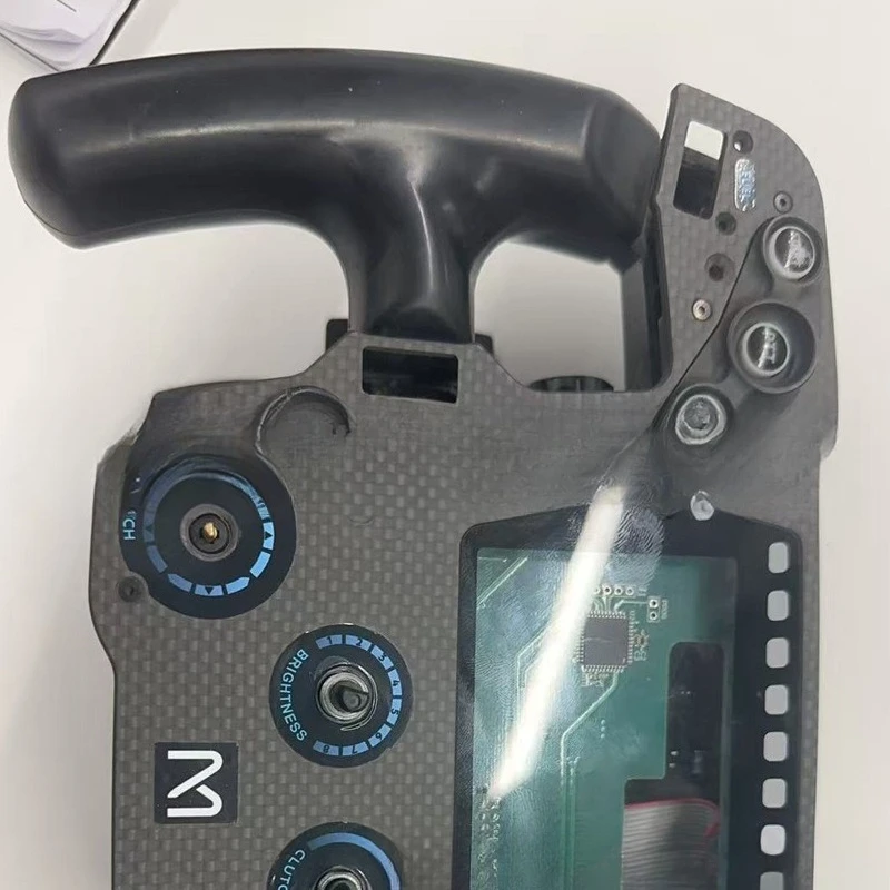 Obudowa z włókna węglowego do kierownicy gamingowej, lekka obudowa z włókna węglowego zintegrowana z kierownicą z włókna węglowego.