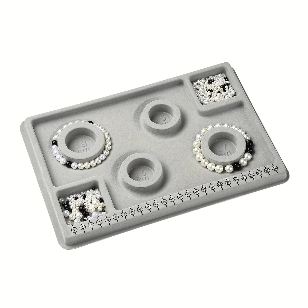 

A small plastic jewelry tray with DIY bead threading tool, perfect for crafting bracelets and necklaces