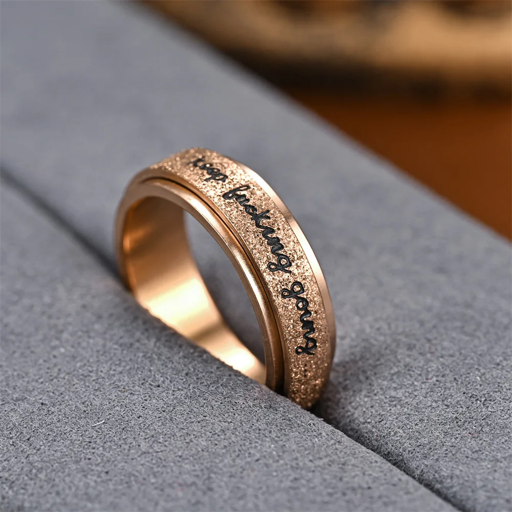 Fashion Unisex Vibrant Stainless Steel Rotating 'Keep Going' Ring Motivational Jewelry Accessory for Daily Wear Wholesale