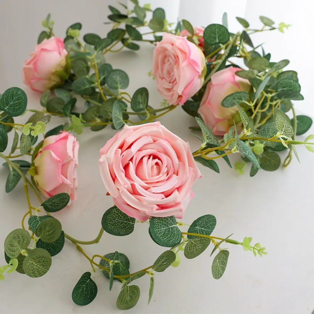 1 قطعة نبات اصطناعي من الحرير الوردي والأوراق الخضراء المعلقة على الحائط لتزيين المنزل ومستلزمات حفلات أعياد الميلاد
