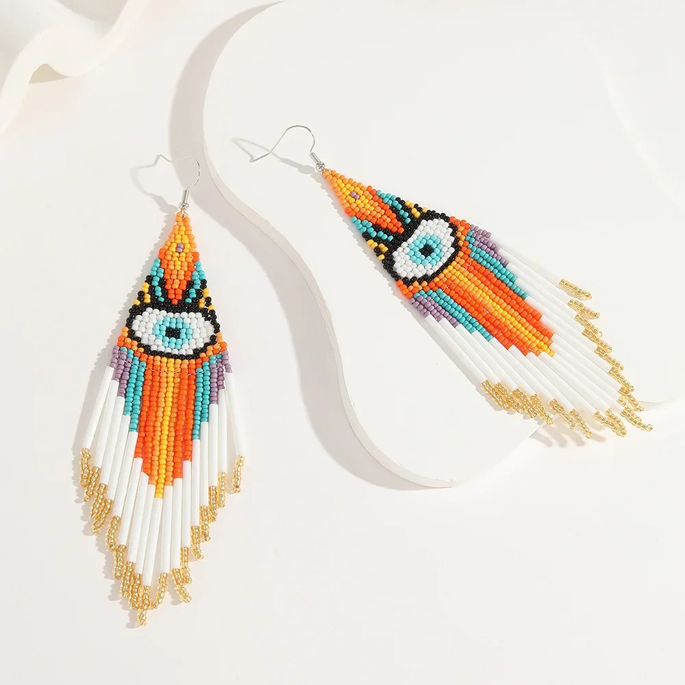 Beaded earrings Tassel Hand knitting Devil's eye Design Rainbow Originality Bohemia Alloy Tide Female Simple Rice bead earrings
