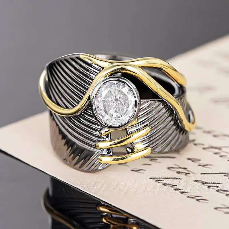 Huitan Ringe mit geometrischem Design für Damen, Party, Alltag, einzigartiges Fingerzubehör, eingelegtes Shing-CZ, 2 Metallfarben, trendiger Schmuck