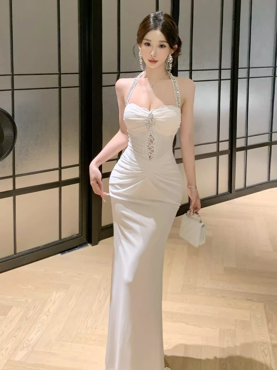 

Элегантное вечернее платье-бодикон с бриллиантовой отделкой, длинное, облегающее, с эффектом стройности талии, идеально для свиданий и вечеринок.