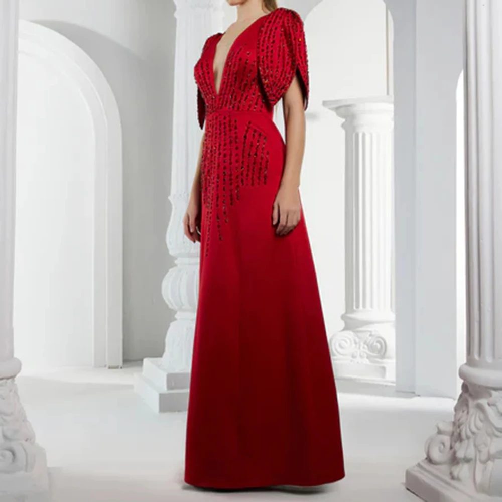 カスタマイズされた A ラインのイブニングドレス 足首までの長さの V ネック ノースリーブ プロムドレス ファッション スパンコール付き シンプル ドレープ 絶妙なパーティードレス