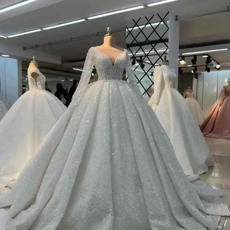 تخصيص الخامس الرقبة سباركلي الثقيلة اللؤلؤ الخرز فستان الزفاف الأفريقي Vestido De Noiva طويلة الأكمام Ballgown أثواب الزفاف