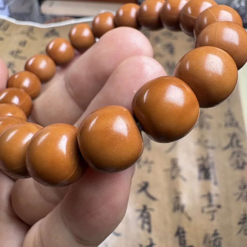B-grade black background, old- carved monkey head walnut bracele, Beijing-style eight-sided peach-shaped beads magic bead