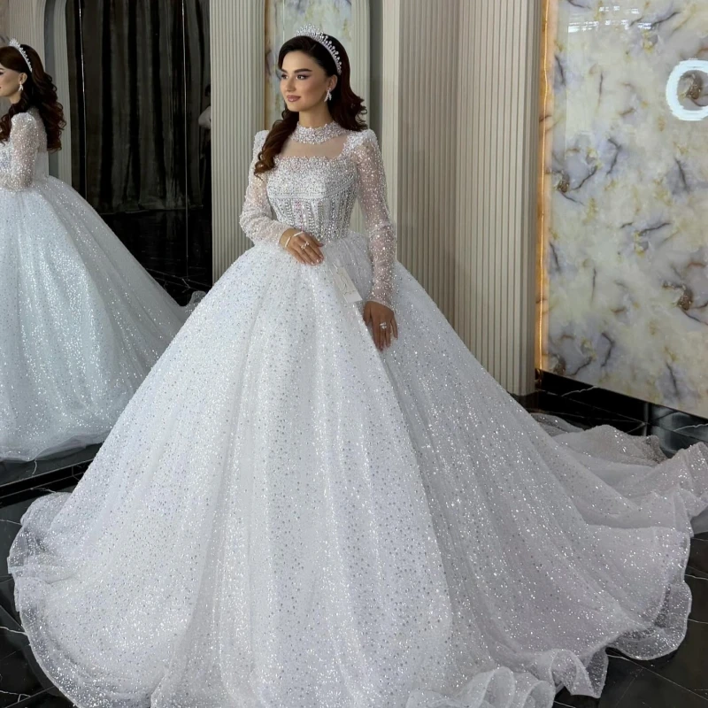 

Luxury White Dubai Arabic Mermaid Wedding Dresses Beading Crystal Long Sleeves Tull Crystal A-Line Court Train Wedding Dress
