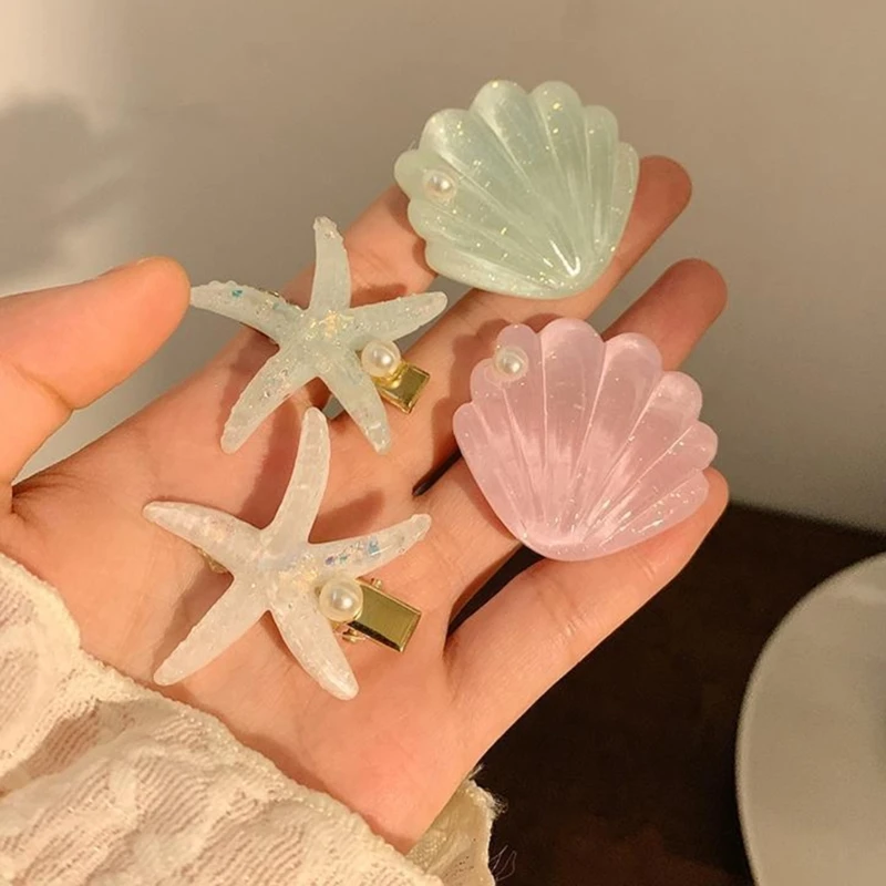 女性用ファッショナブルなマリンインスピレーションのヘアピンシースター/シェル型ヘアアクセサリーミュージックフェスティバルスタイルのヘアジュエリー
