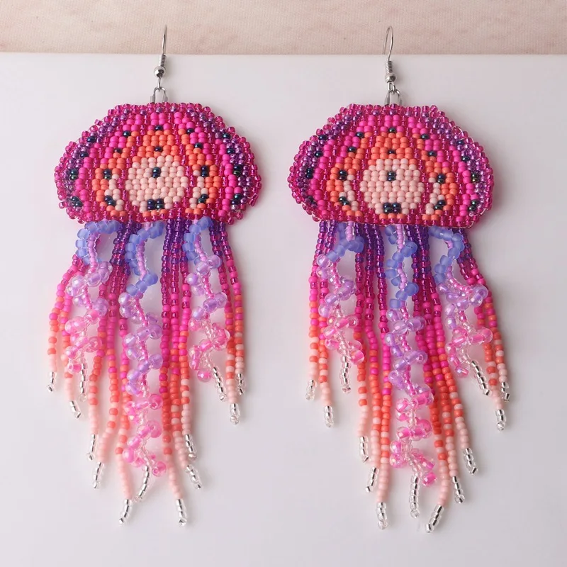 Rice bead earrings Tassel Medusa Design Originality Hand knitting Gradient Bohemia Alloy Fashion Simple Beaded earrings
