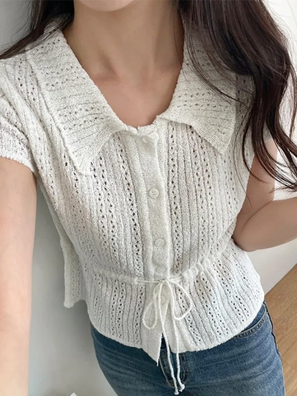 เสื้อถักคอวีผูกเอวสไตล์วินเทจใหม่ประจำฤดูร้อนปี 2025 จากทงแดมุน เสื้อสเวตเตอร์สไตล์เกาหลีสำหรับผู้หญิง ทรงหลวมทันสมัย