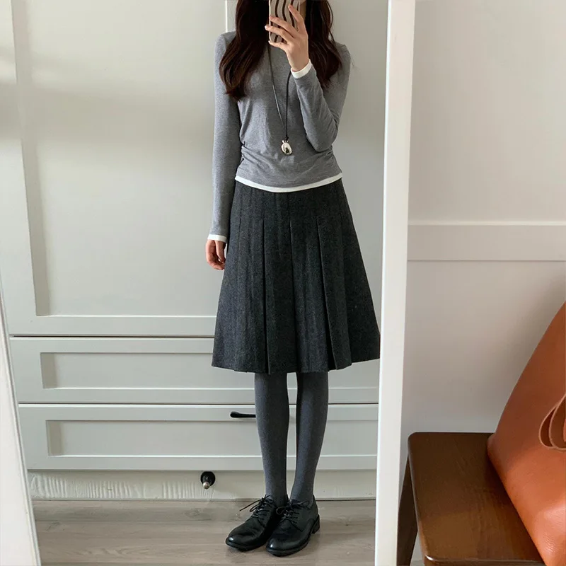 امرأة الصوفية النسيج مطوي تنورة الخريف الشتاء تنورة تخفيف ألف خط تنورة فتاة عالية الخصر تنوعا مزاجه الأوسط تنورة