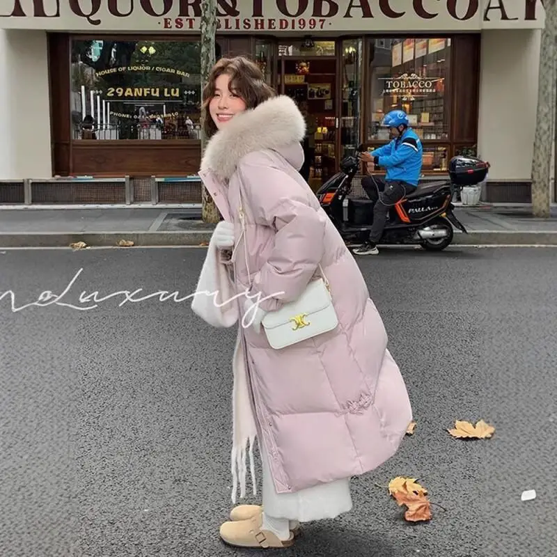 

Korean version cotton-padded jacket Women's new model winter thicken long style loose thicken coat thickened solid top elegance