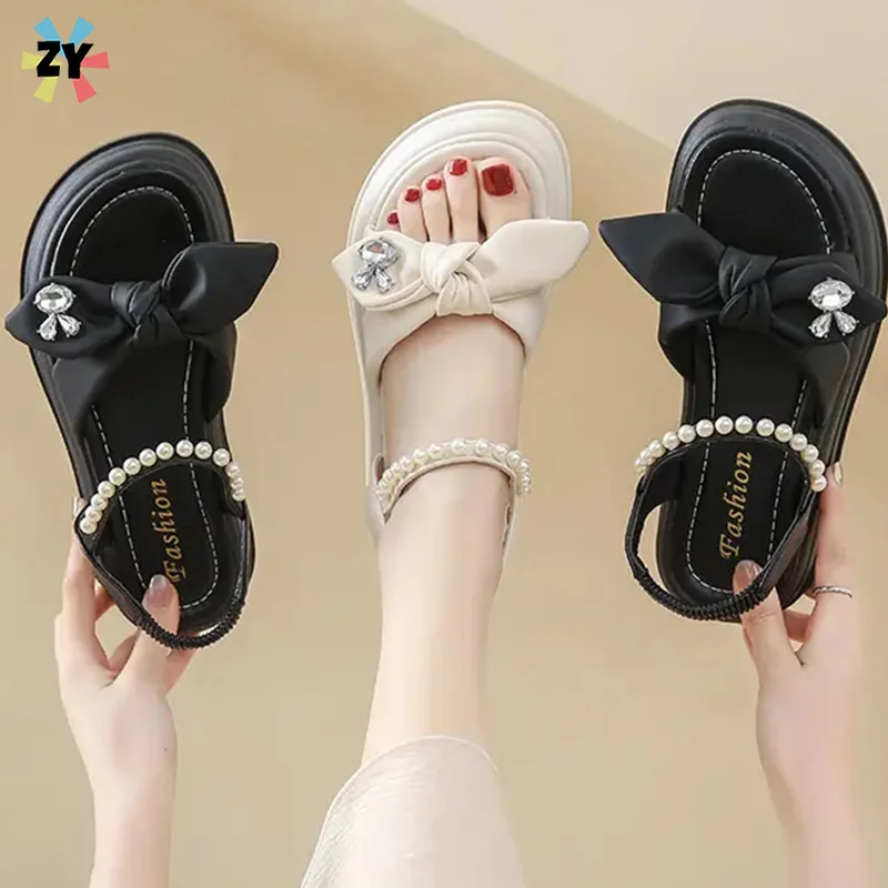 

Hot selling sandals for women in summer new thick soled fairy style pearl beach shoes soft soled fashion shoes