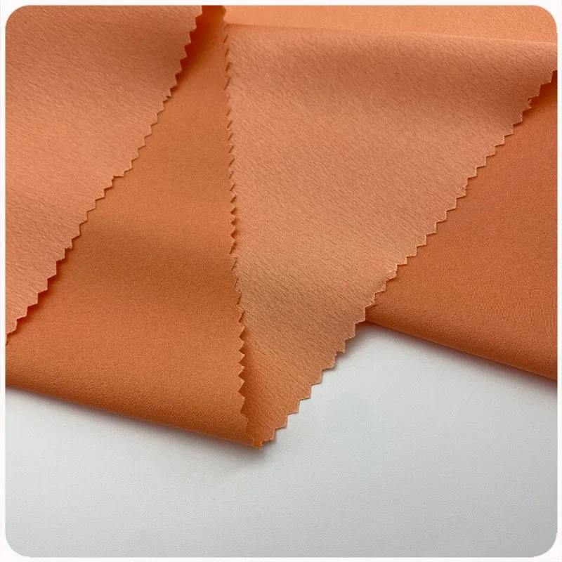 

Snowflake silk lightweight and breathable satin fabric imitates crackle crease dress