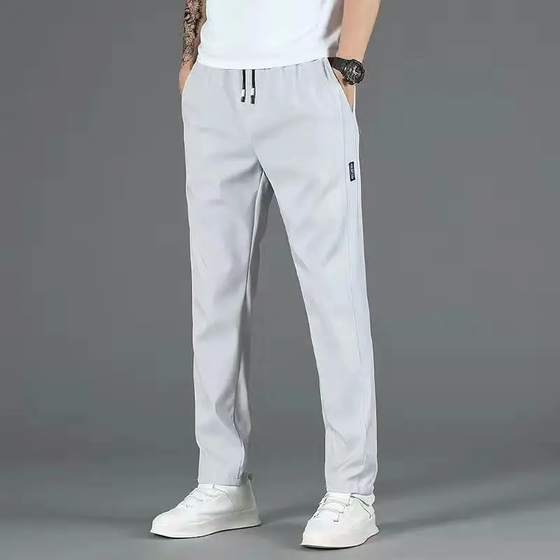 

Summer Elastic Waist Loose Breathable Ice Silk Casual Pants Men's Solid Drawstring Pockets Sports Quick Drying Straight Trousers