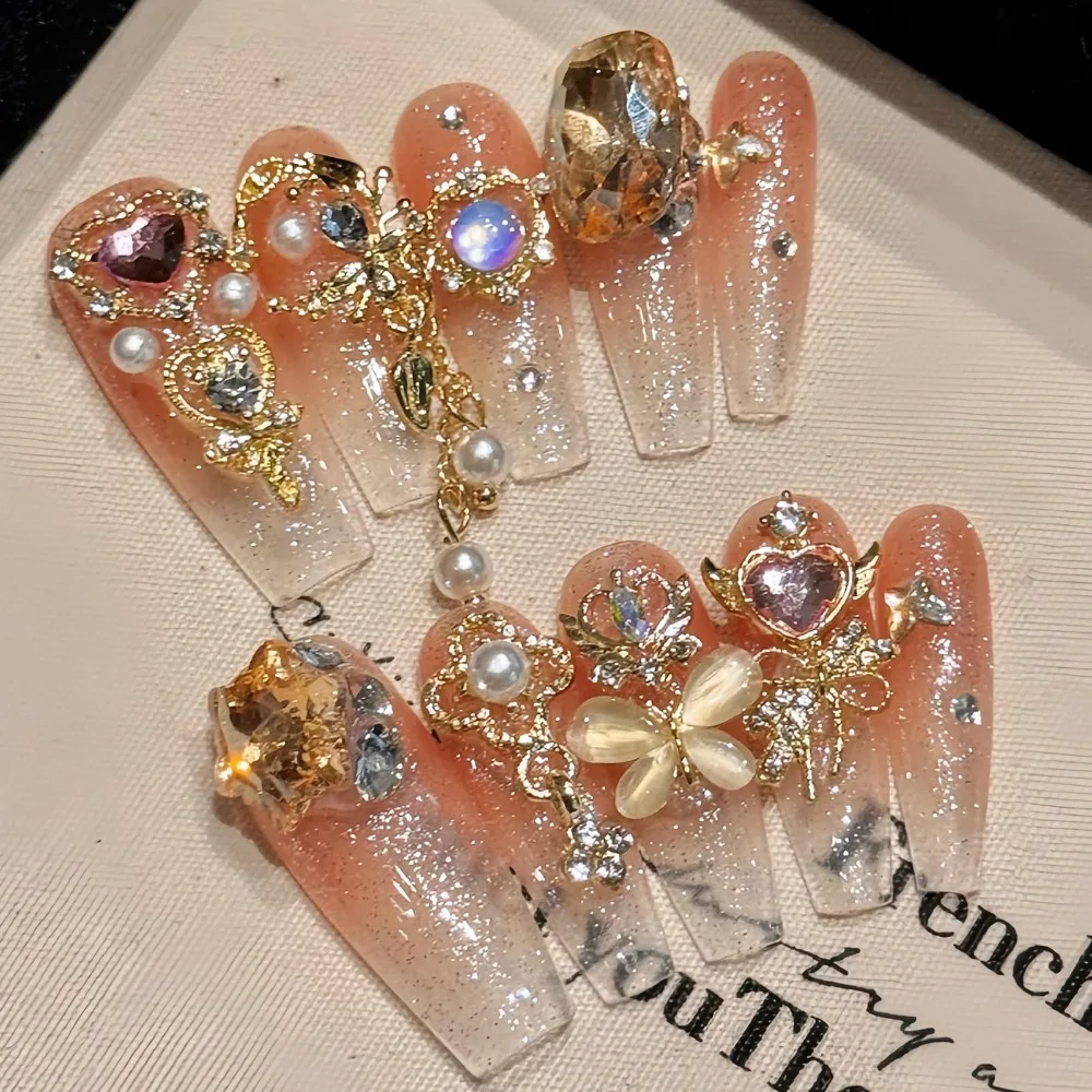 เล็บปลอมแบบกดติด 3 มิติ ลายมุก ประดับกลิตเตอร์ พร้อมสติกเกอร์เจลลี่ ลายโบว์และลายหัวใจ