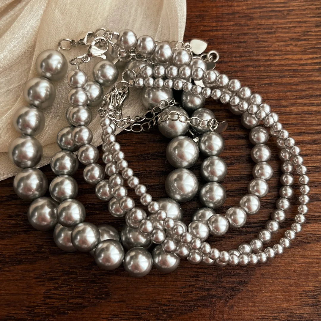 

616 color round strong light Shijia platinum gray multi-hemp shell pearl bracelet
