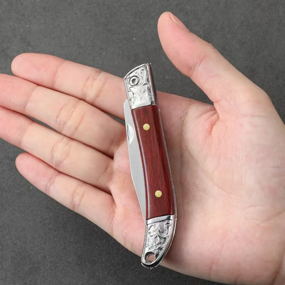 Stainless steel plastic wood carved pattern folding knife outdoor camping tactical hunting knife sharp and durable pocket knife