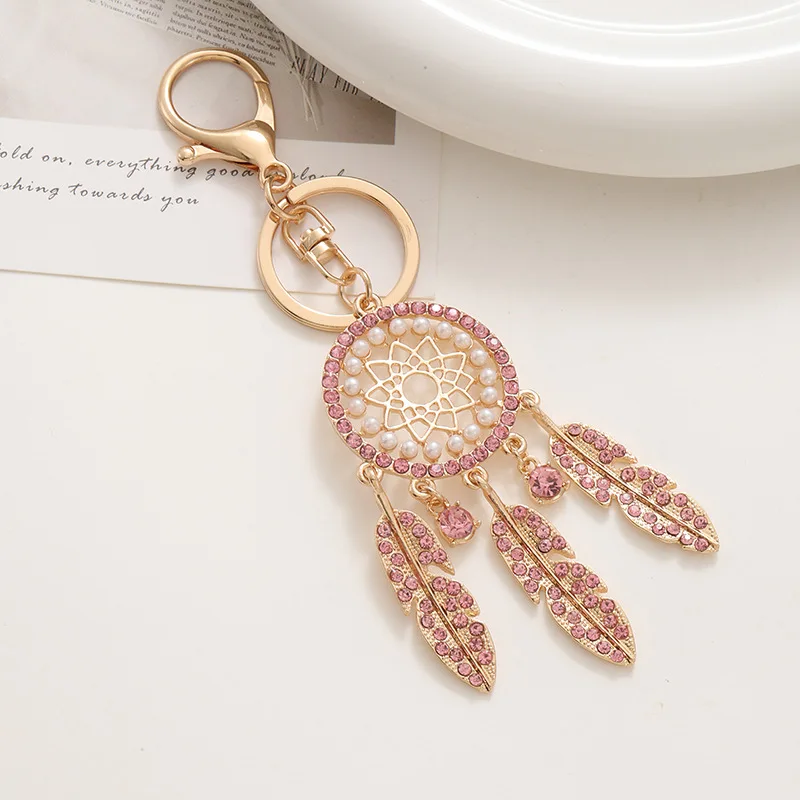 Ladies' Bag Pendants Creative Metal High-quality Keychains Gorgeous Verstaile Feather Bag Diamond Hollow Exquisite Accessories