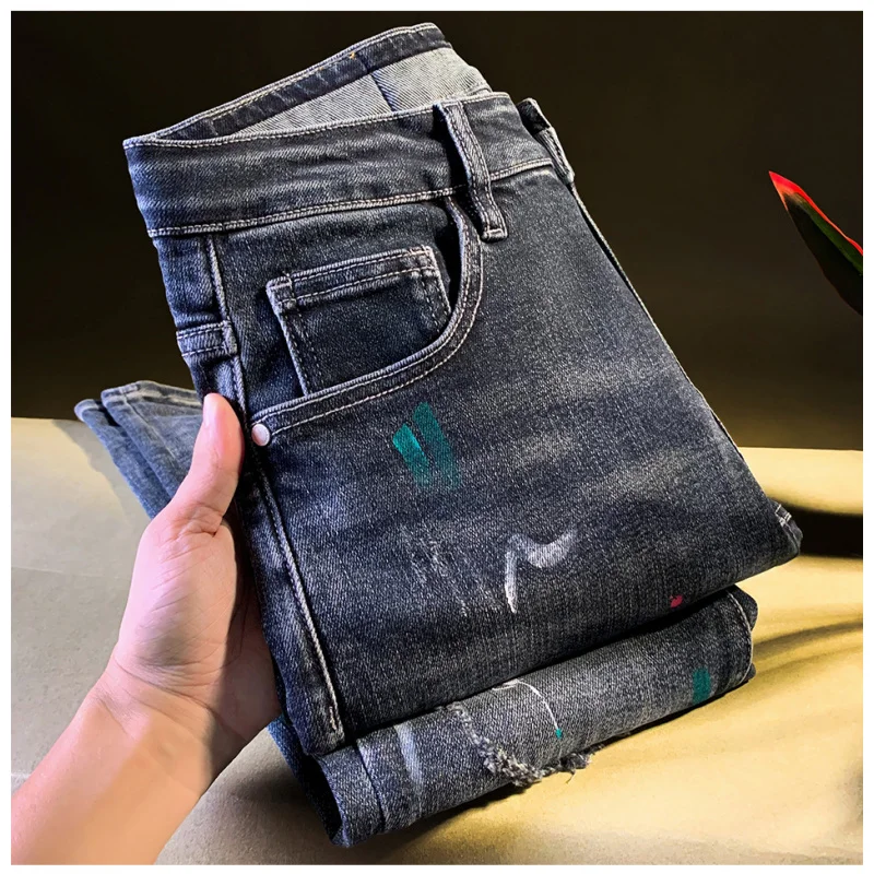 

Модные мужские джинсы в американском стиле весной и осенью, приталенный крой, эластичный, на маленьких ногах, с вырезами и рваными дырками, длинные брюки.