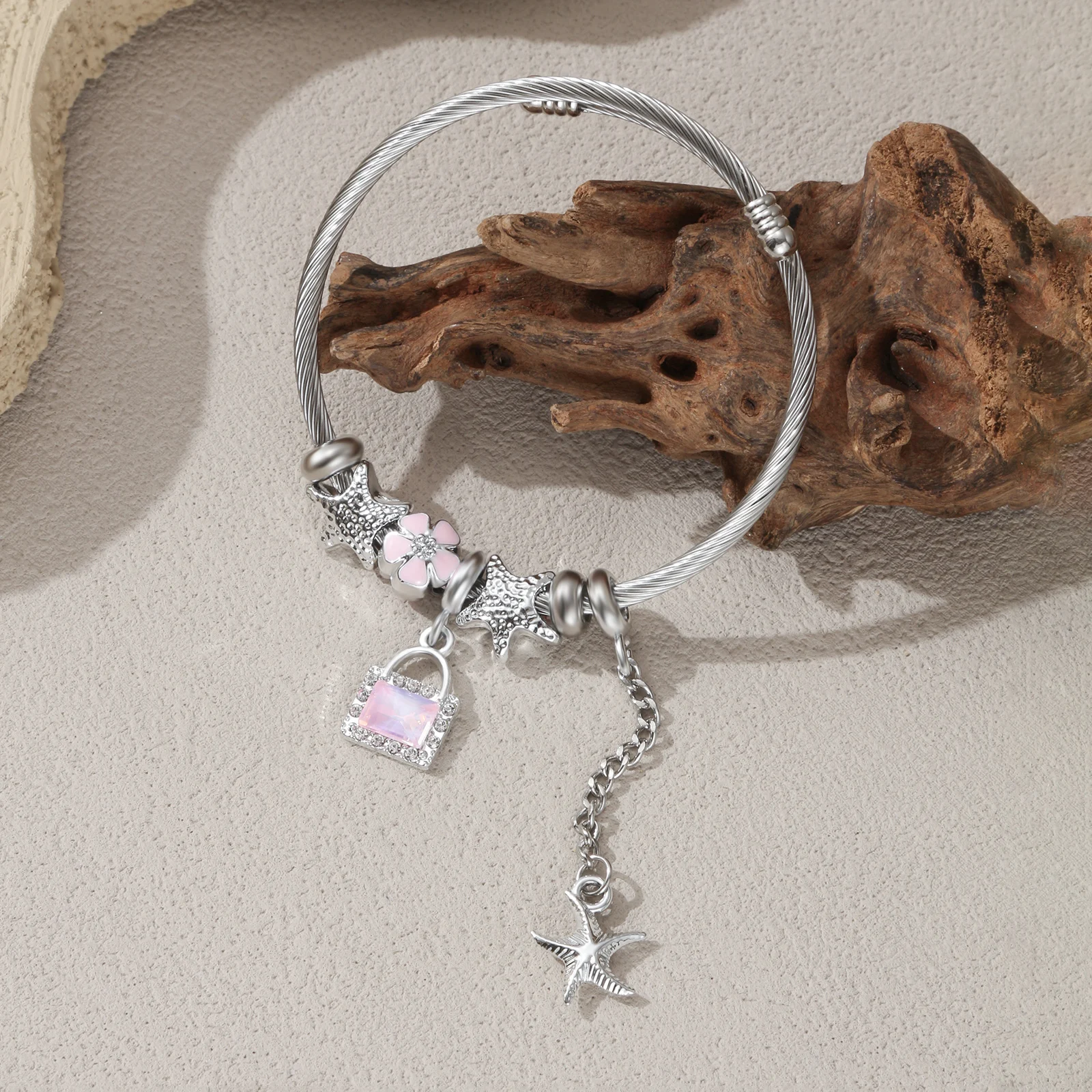 

Silver Tone Ocean Charm Bangle with Pink Lock and Starfish Pendant for Women
