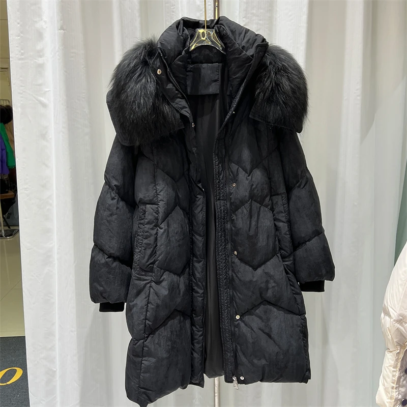 سترة نسائية شتوية جديدة لعام 2025 بياقة من فرو الثعلب y2k عالية الجودة ممتدة فضفاضة وسميكة من ريش البط الأبيض معطف أنيق