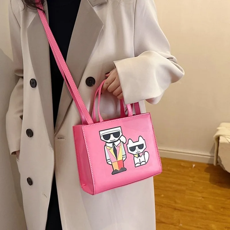 2025 Nuova borsa tote in tela Borsa a tracolla semplice Borsa da pranzo portatile Borsa da donna portatile di grande capacità