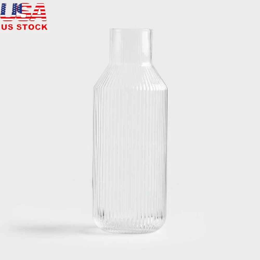 

Clear Ribbed Glass Carafe 50oz Dishwasher-Safe Beverage Server Cold Drinks Modern Design Textured Look