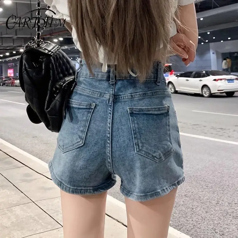 Pantalones cortos de mezclilla para mujer, con doble botón, ajustados, sexys, Retro americano, cintura alta, elásticos, línea A, pantalones calientes Ins