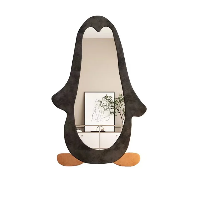 

The full-length mirror falls to the ground