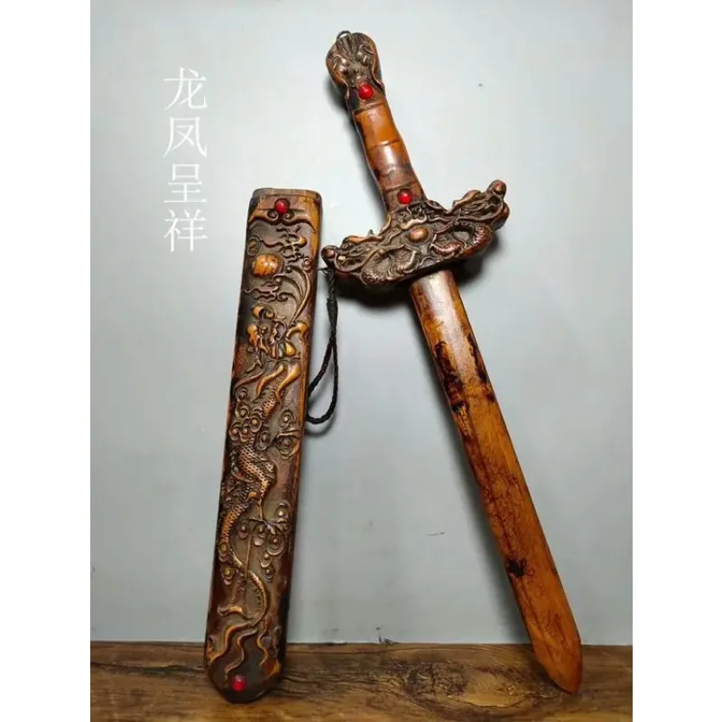 old peach wood sword with double-sided carving