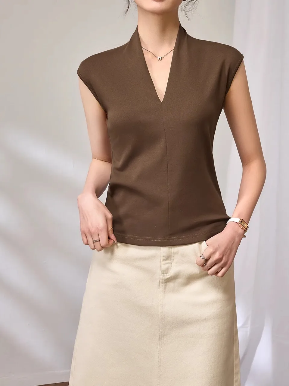 تي شيرت نسائي كاجوال بدون أكمام بلون واحد بأسلوب الشارع ضيق مناسب للصيف قصير للغاية بسماكة عادية