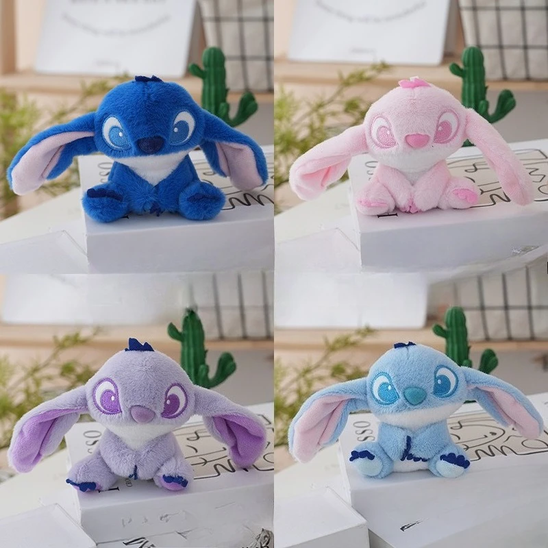 Lindo y encantador Stussy juguete de peluche llave llavero de peluche extraño juguete de peluche mochila colgante