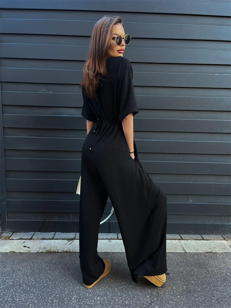 気質通勤レディースジャンプスーツ2025夏新作無地タイウエストディープVネックカジュアルジャンプスーツワイドレッグパンツ