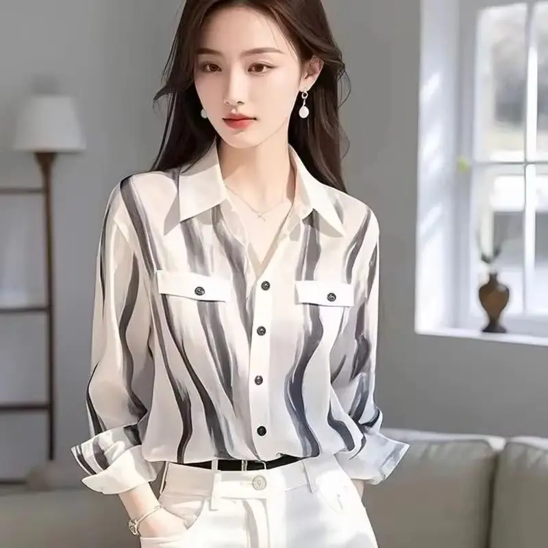 2025New Super Schöne Weiß Gestreiften Hemd Frauen Frühling Sommer Mantel Französisch Nische Chic Weibliche Top Dünne Beiläufige Schöne Bluse Damen