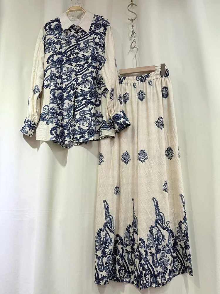 A two-piece set of retro geometric printed lapel straight shirts and loose wide-leg pants for women's wear in the autumn of 2025