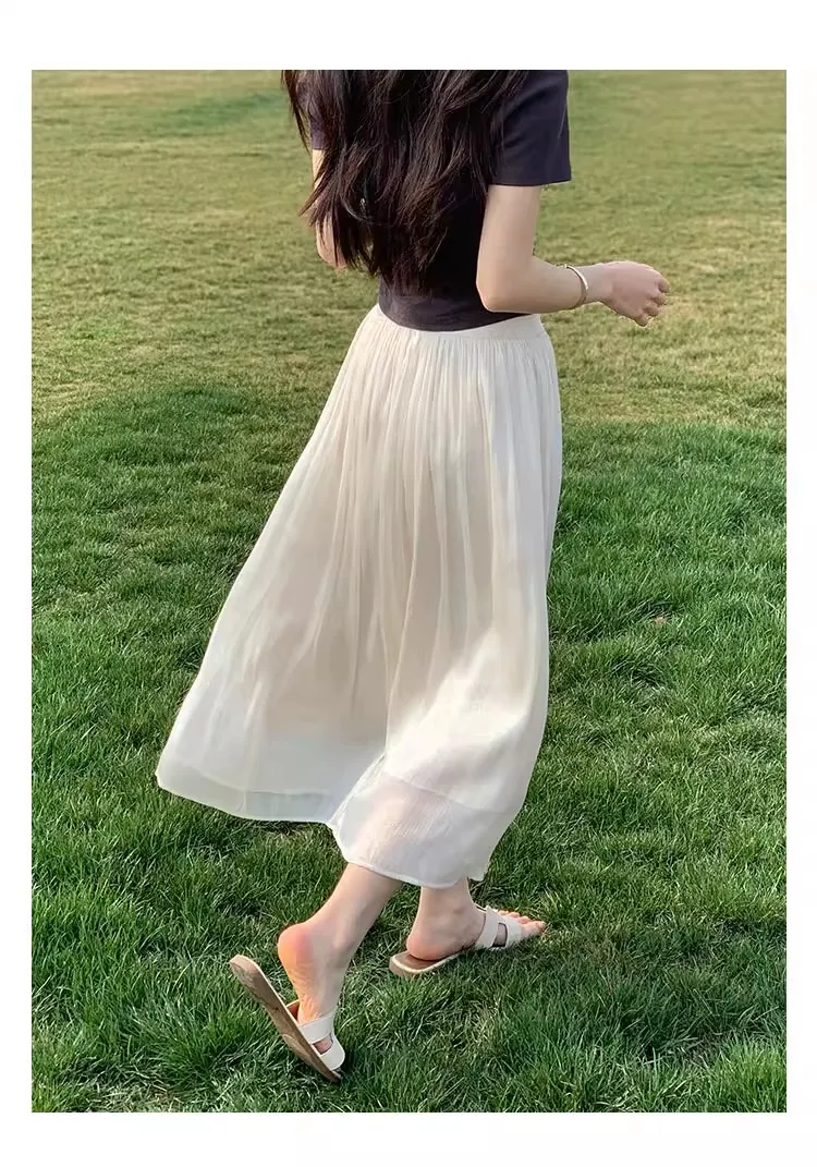 2026 Frühjahr/Sommer Neuer Glänzender A-Linien-Rock für Damen, Einfarbig, Hohe Taille, Französischer Pariser Stil, Eleganter Asymmetrischer Rock – Detail 21