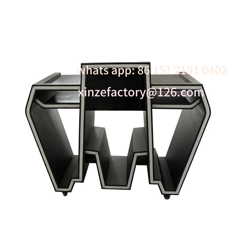 Stół DJ-owski z możliwością personalizacji, stół mikserski, sprzęt PARTYK, bar w kształcie litery M, specjalny barowy stół świetlny w kształcie litery M.