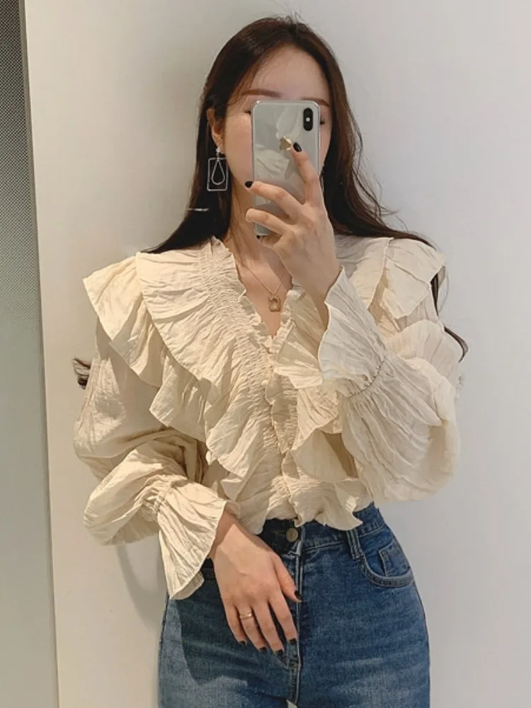 Chique vroege herfst afslankende V-hals knoopdetail geplooide Bell Sve irt top dames Faion lente herfst pure kleur lang S...