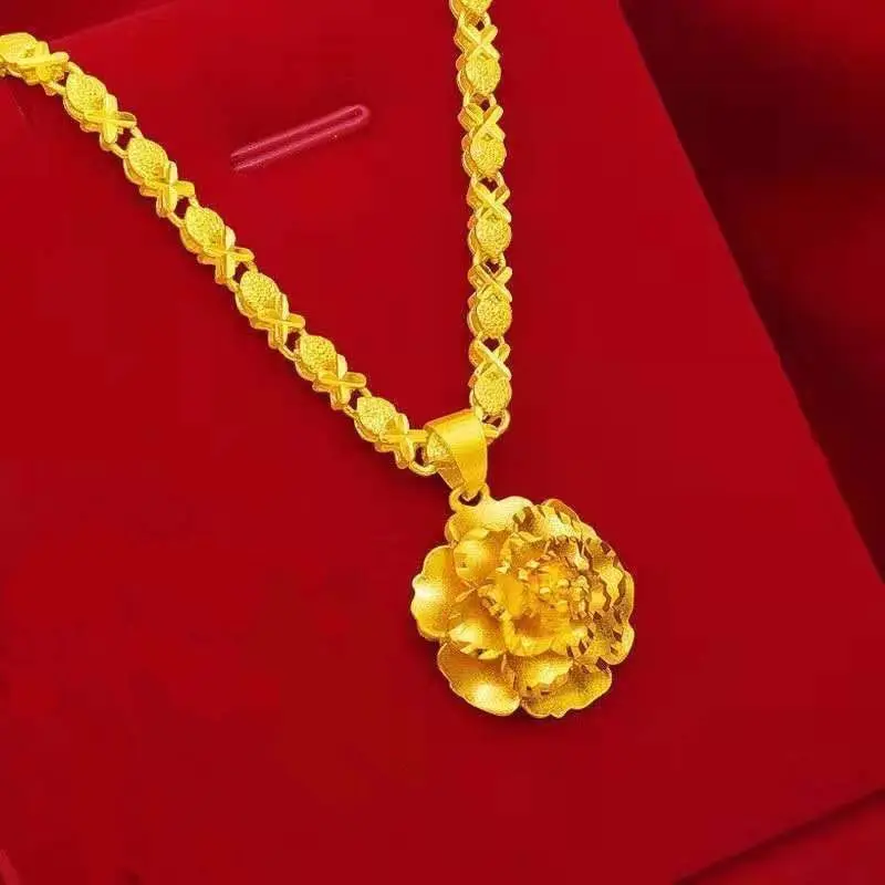 

Аутентичное вьетнамское изысканное ожерелье с подвеской в виде хвоста феникса, золотистого цвета, с матовой крупной подвеской в виде цветка "Цветущее процветание".