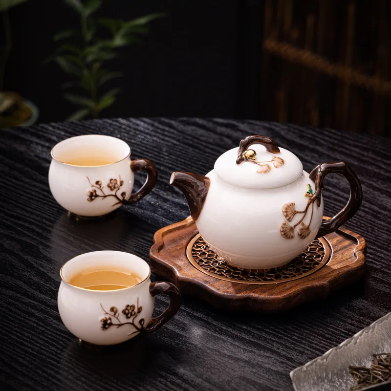 

Ice kind jade porcelain side pot plum blossom pot contented pot a pot two cups ceramic tea set teapot